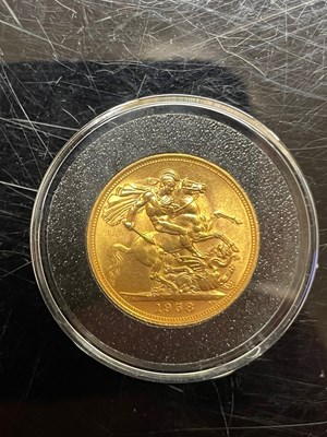 Lot 241E - A 1958 Elizabeth II gold sovereign.