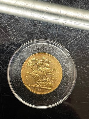 Lot 241G - A Victorian gold sovereign dated 1884.