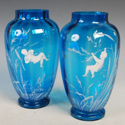Lot 5 - A pair of Mary Gregory style blue glass vases,...