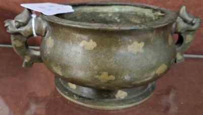 Lot 9 - A Chinese bronze twin-handled censor decorated...