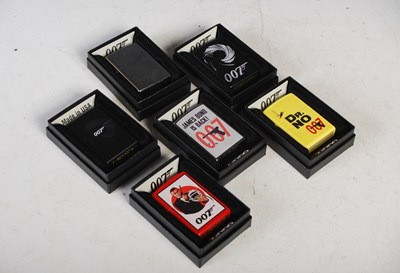 Lot 277 - A group of six James Bond themed Zippo...