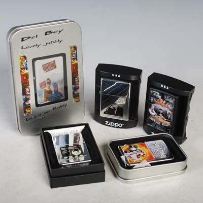 Lot 281 - Three boxed Zippo lighters and two others...