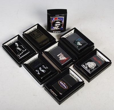 Lot 287 - A group of eight boxed Zippo lighters,...