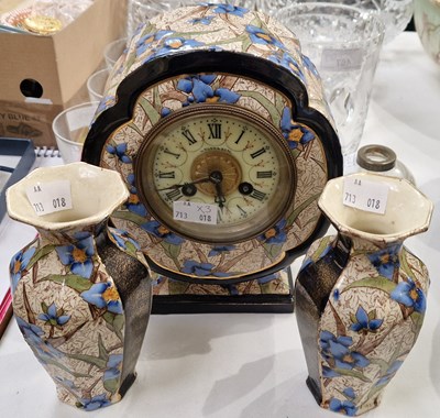 Lot 315 - A 19th century ceramic clock garniture...