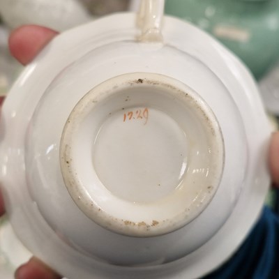 Lot 326 - A 19th century Rockingham part tea service,...