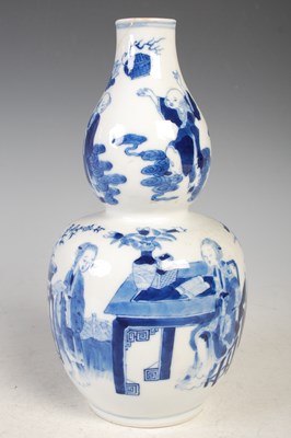 Lot 16 - A Chinese porcelain blue and white double...