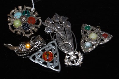 Lot 77 - Five assorted Scottish white metal brooches,...