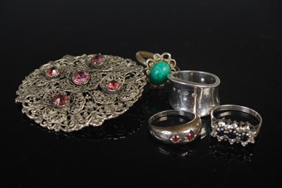Lot 60 - Four assorted white metal dress rings together...