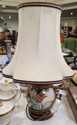 Lot 355 - A Moorcroft Pottery table lamp and shade, the...