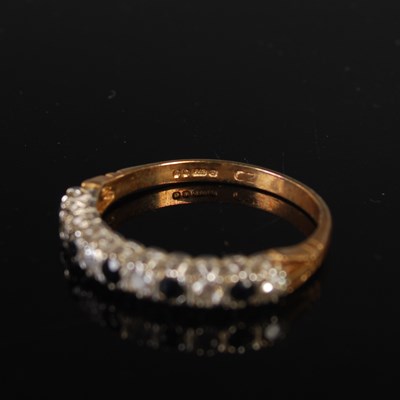 Lot 88 - A 9ct gold gem set half-hoop eternity ring,...