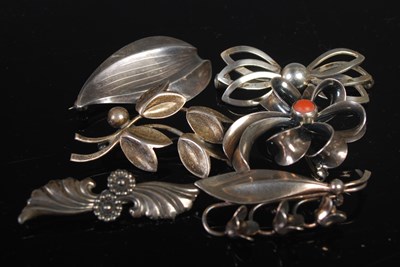 Lot 132 - Six assorted Danish sterling silver brooches.