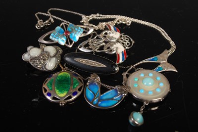 Lot 142 - A collection of silver and white metal enamel...