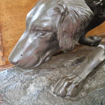 Lot 405 - After Georges Cardet, a bronzed resin figure...