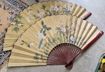 Lot 413 - Two large Japanese lacquered wall fans,...