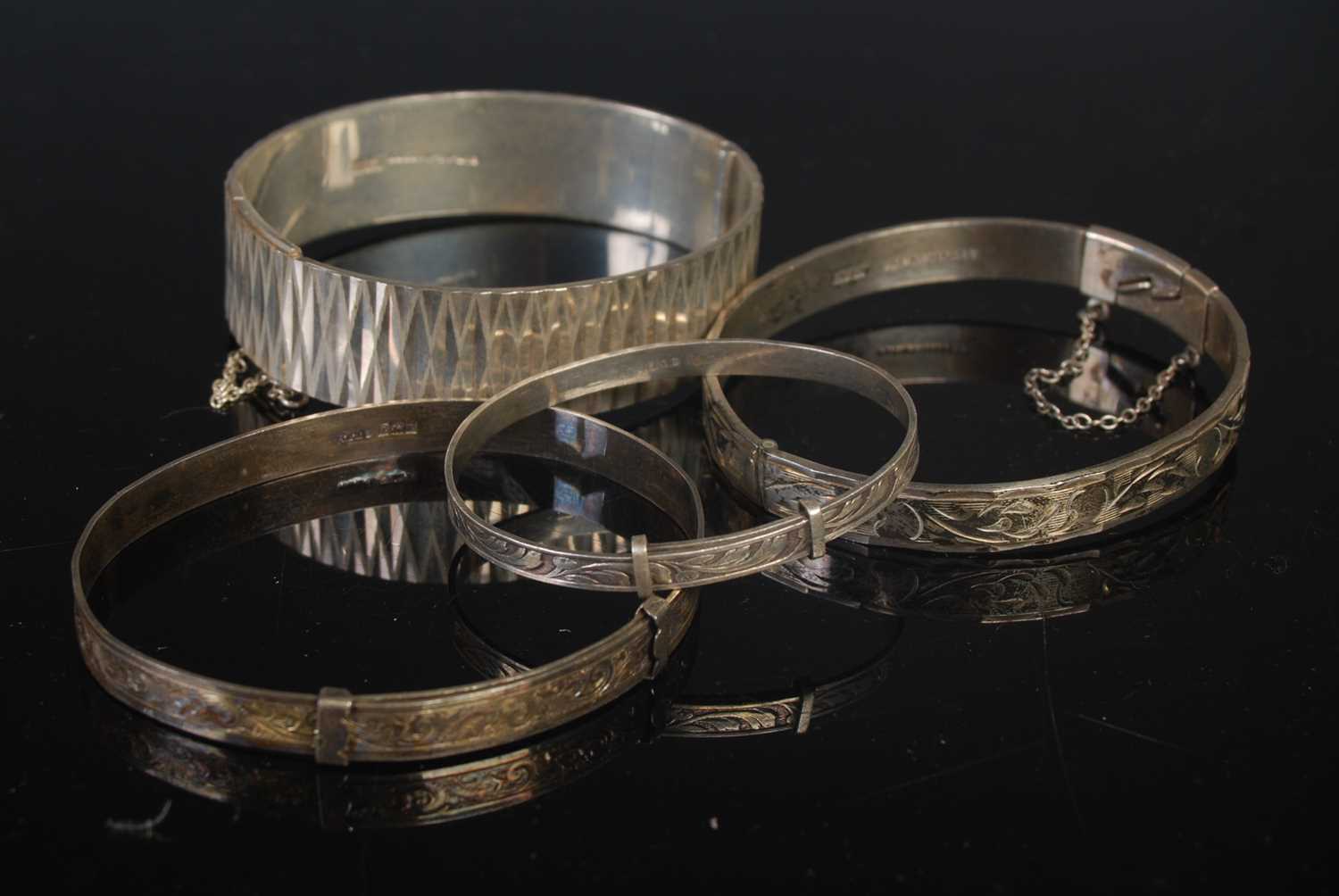 Lot 155 - Three assorted hallmarked silver bangles, 2.3...