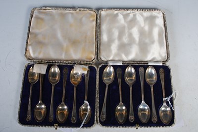 Lot 162 - Two cased sets of six Sheffield silver coffee...