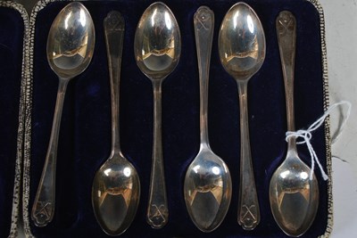 Lot 162 - Two cased sets of six Sheffield silver coffee...