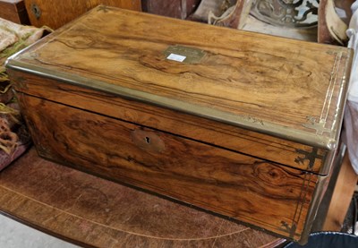 Lot 425 - A late 19th century walnut and brass bound lap...