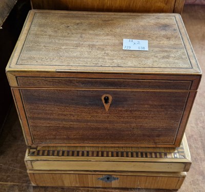 Lot 427 - A Georgian mahogany tea caddy with boxwood and...