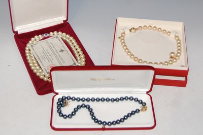 Lot 78 - 'Camrose & Kross', a cased double strand pearl...