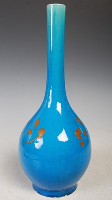Lot 23 - A Japanese blue ground pottery bottle vase...