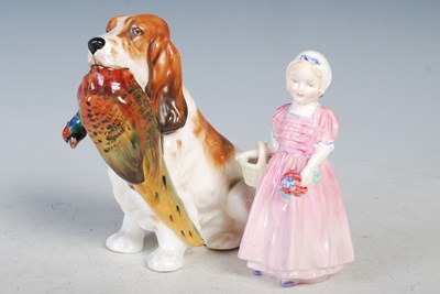 Lot 170 - A Royal Doulton figure of a spaniel and cock...