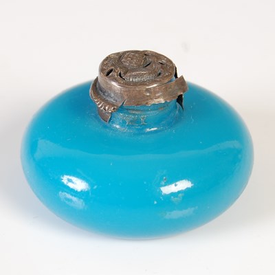 Lot 85 - A small white metal mounted blue glass scent...